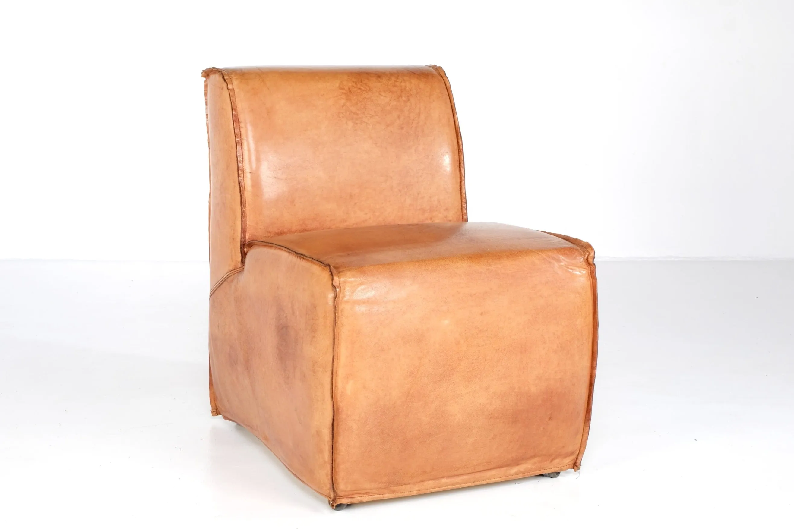 INDUSTRIAL LIGHT TAN LEATHER SLIPCOVER ROLLING CHAIRS