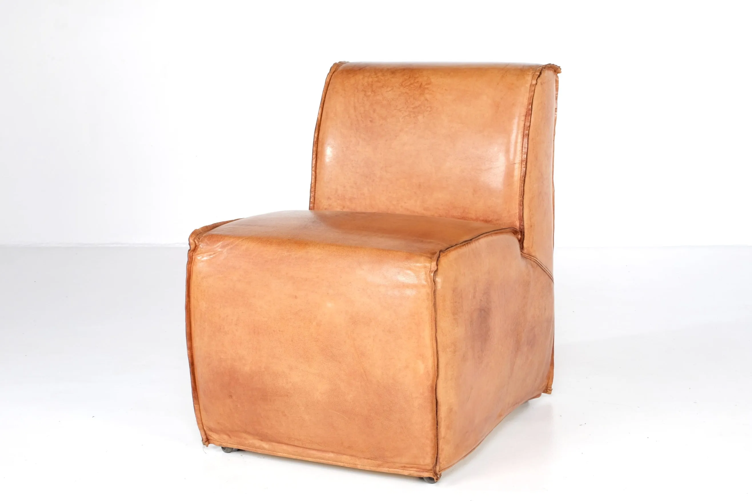 INDUSTRIAL LIGHT TAN LEATHER SLIPCOVER ROLLING CHAIRS